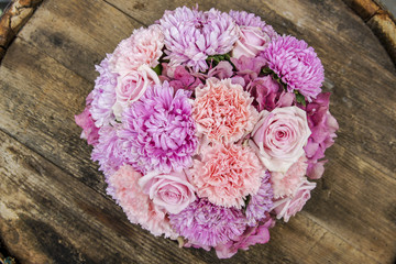 Pink wedding bouquet with carnations and roses