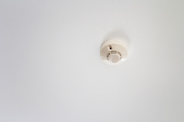 Fire and smoke detector installed on ceiling