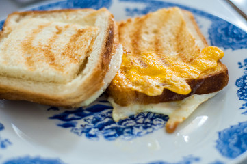 Eggy bread on the plate, photographed with natural light. 