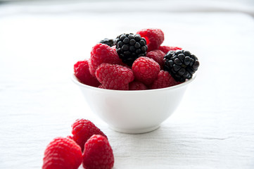 Fresh blueberries in a bowl on whote table