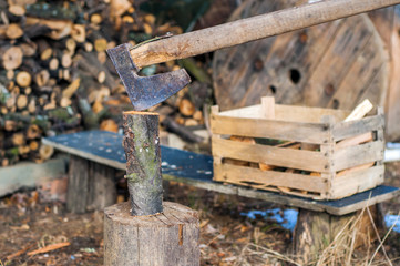 Strong lumberjack chopping wood, chips fly apart. ax, hatchet, 