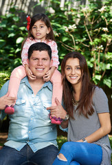 Family of three in park