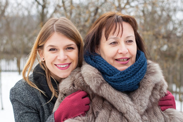 Middle aged woman with her lovely daughter