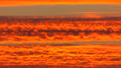 Fiery red sunset clouds