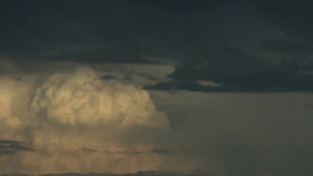 Angry Thunderheads in Distance at Sunset
