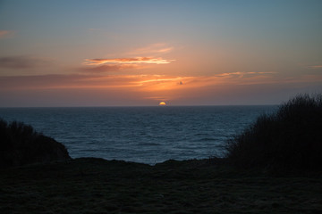 Obraz premium Couché de soleil à la mer