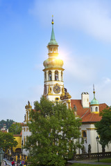 Fototapeta na wymiar Exterior facade of Loreta church in Prague..