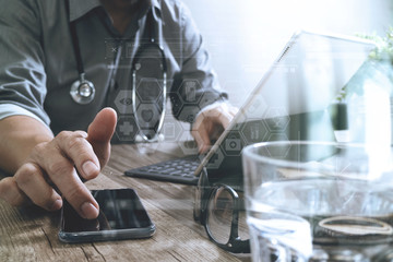 smart medical doctor hand working with smart phone,digital table