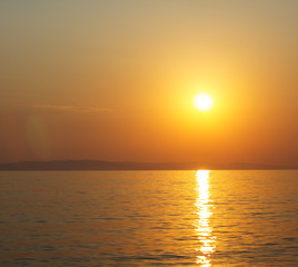 Fototapeta na wymiar Amazing colors of sunset over summer sea.