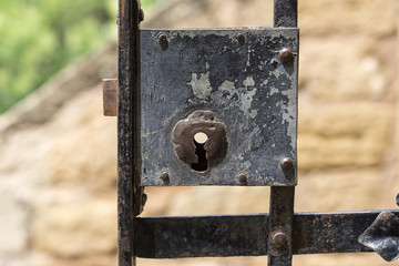 Closeup vintage door lock of external Iron lattice