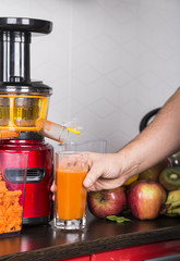 juicing fresh beautiful bright vegetables and fruits