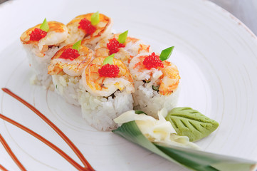 sushi on a black wooden surface