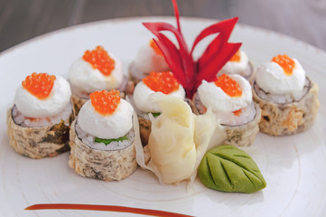 sushi on a black wooden surface