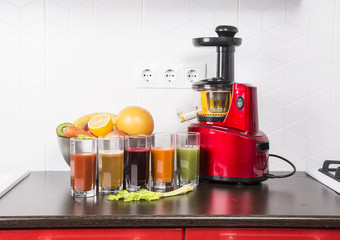 juicing fresh beautiful bright vegetables and fruits