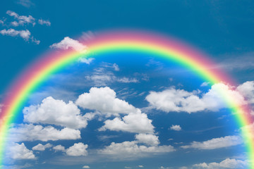Blue sky and white cloud with rainbow background.
