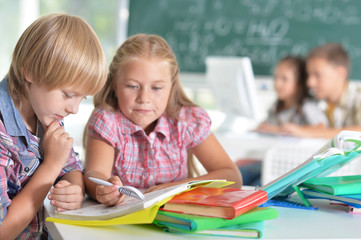 brother and sister doing homework