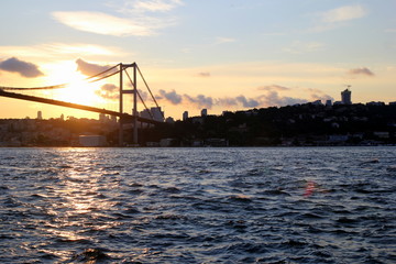 Fototapeta na wymiar Istanbul, Turkey. The sunset on the Bosphorus with the view on the bridge.