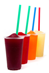 Colorful slushy, summer drink with straw