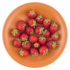 Strawberries in a ceramic plate isolated on white background.