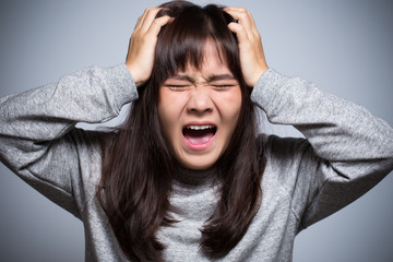 Angry woman on isolated background