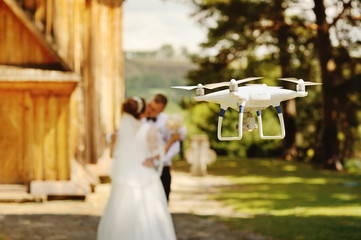 dron filming a wedding couple