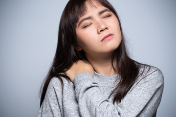 Fototapeta premium Woman has neck pain