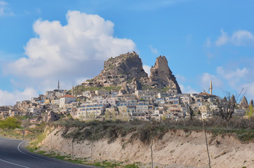 Fototapeta premium Beautuful view on the rocks and old town in Cappadocia, Turkey. Spring