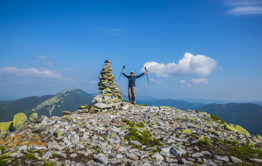 The woman at mountain top. Carpathian national natural park