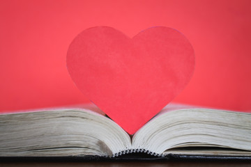 Red heart with book