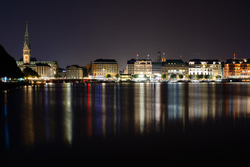 Panoramic view of Hamburg from Alster lake at night. Germany