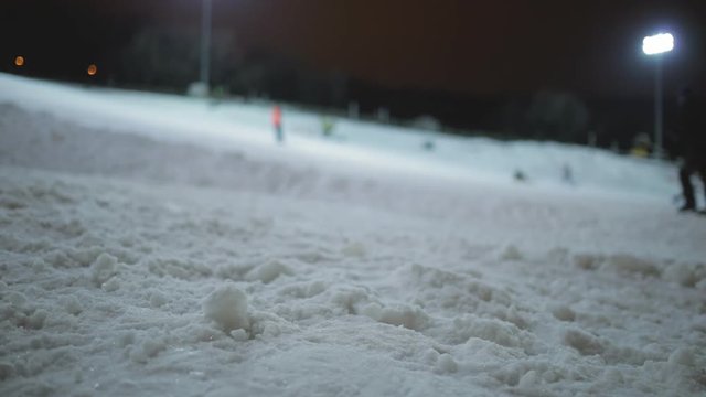 Ski slope with unidentified people - blurred focus background