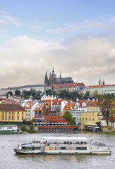 Naklejka na ściany i meble Old Prague, Vltava river under Autumn sun
