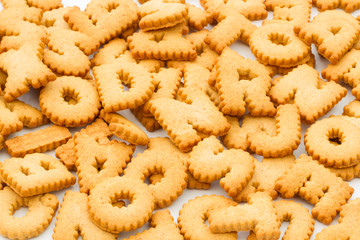 Alphabet shaped cookies filling the frame