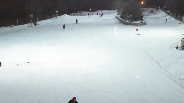 Ski slope with unidentified people - front view