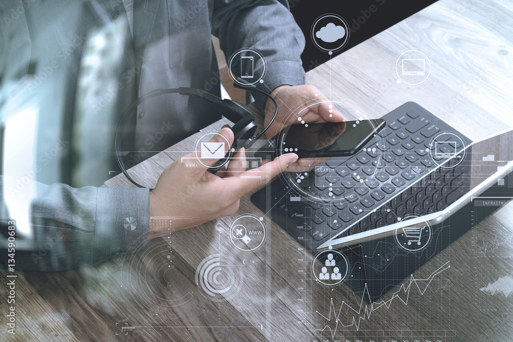 Poster top view of man hand using VOIP headset with digital tablet comp