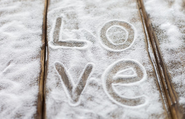 Heart, love on the background of the boards is not the background of snow, Valentine's day, the holiday of love
