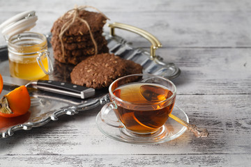 tea with oat cookies on tray