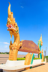 Naga sculpture at Tha Sadet Walking Street, Thai-Lao Pier Border. Translated Thai to English as " Tha Sadet Pier, the edge of Thailand border at Nong Khai City".