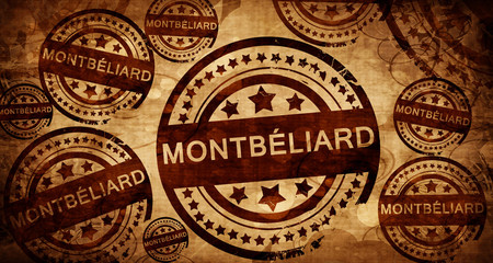 montbeliard, vintage stamp on paper background