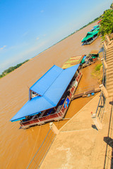 Raft Float Food shop on Mekong River with blue sky background 