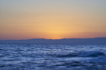 Fototapeta na wymiar Sea waves after sunset from Enoshima, Kanagawa Prefecture, Japan