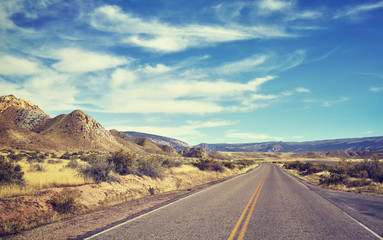 Color toned endless road, travel concept picture, USA