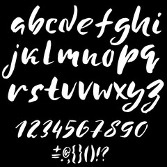 Hand drawn font made by dry brush strokes. Grunge style alphabet
