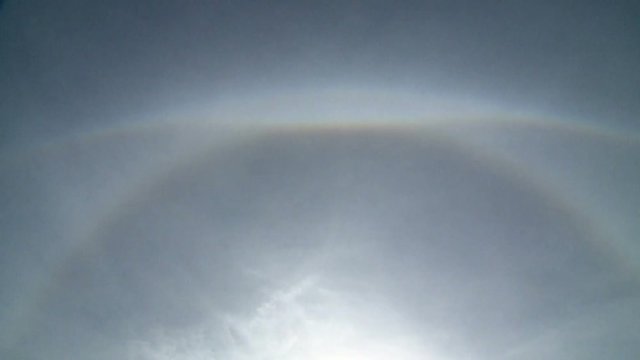 Sunlight and Ice Crystal Clouds Create Sky Art