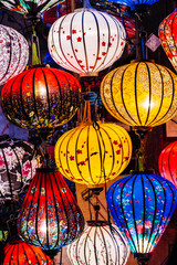 Colorful lanterns spread light on the old street of Hoi An Ancient Town - UNESCO World Heritage...