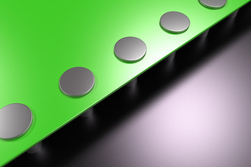 Rectangular colored plate on black background with rivets