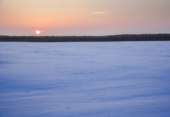 Fantastic evening winter landscape. Dramatic overcast sky. Creative collage. Beauty world.