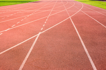 A stadium is a place for outdoor sports consists of a field or stage either partly or completely surrounded by a tiered structure designed to allow spectators to stand or sit and view the event.