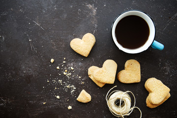  Valentine's cookies  with coffee on texture background, copy space