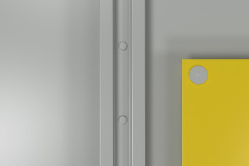 Rectangular colored plate on white background with rivets